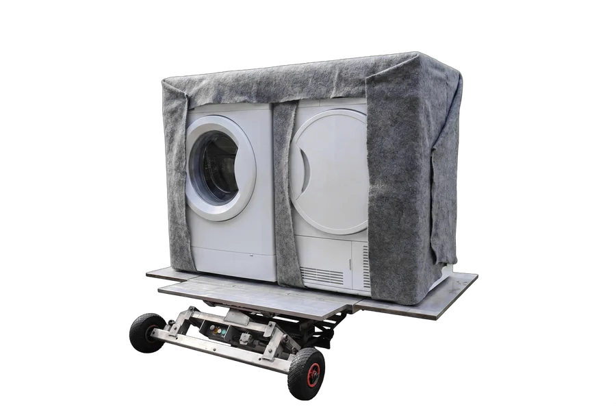 Wasmachine en droger samen op het plateau, klaar voor de rit naar boven